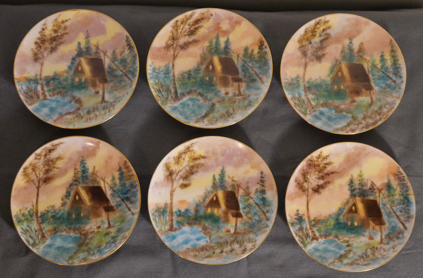 Set of 6 Circa 1900 American Impressionist Style Forest Cabin Landscape Motif Painted Porcelain Gilded Rim Appetizer Plates