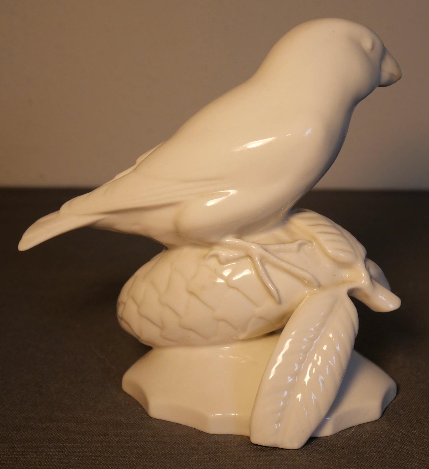 1909-1925 German Art Deco Schwarzburger Werkstätten für Porzellankunst White Porcelain Bird on Pinecone Figurine