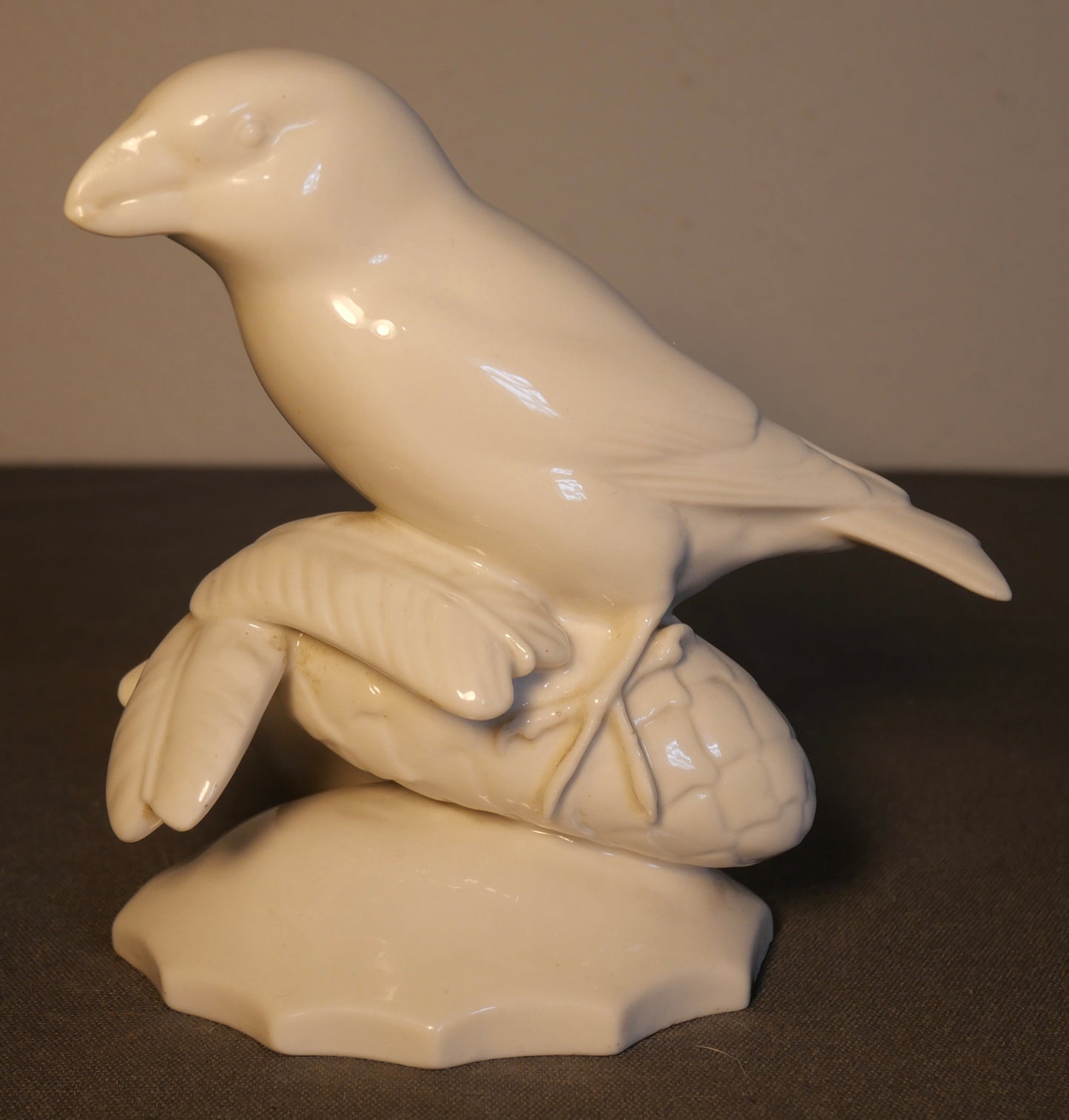 1909-1925 German Art Deco Schwarzburger Werkstätten für Porzellankunst White Porcelain Bird on Pinecone Figurine