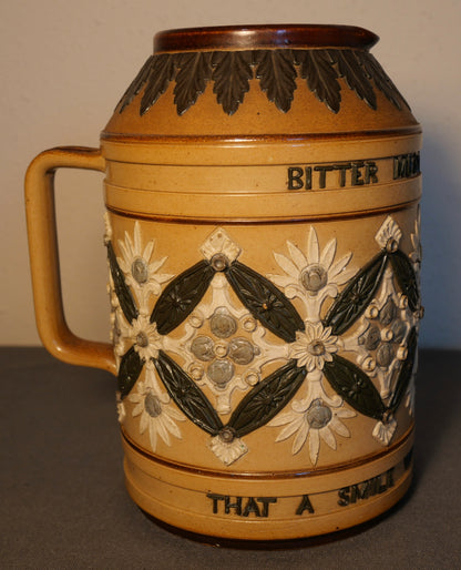 Late 19th Century English Victorian Doulton Lambeth Stoneware "Bitter Must Be The Cup That A Smile Will Not Sweeten" Pitcher