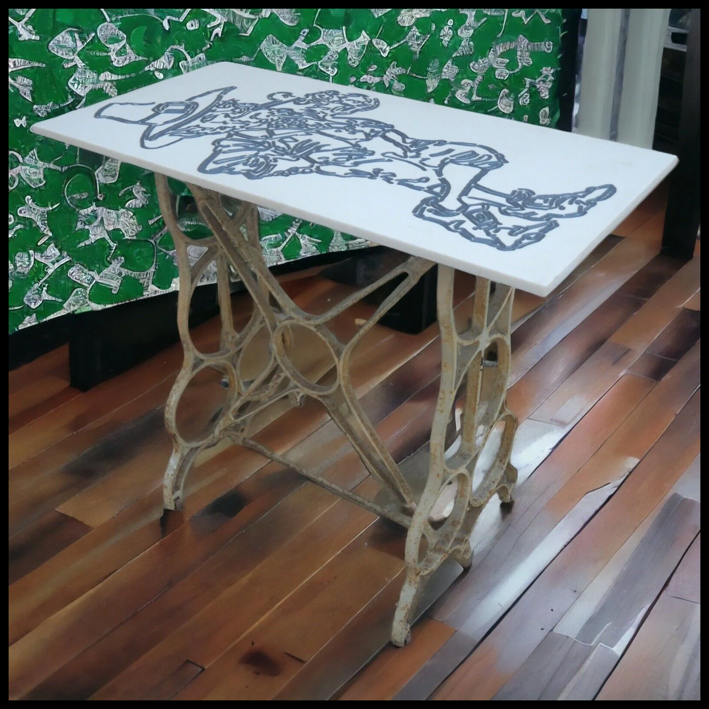 Mid 20th Century American Leprechaun Motif Resin Top Accent Table with Early 20th Century Cast Iron Sewing Machine Base