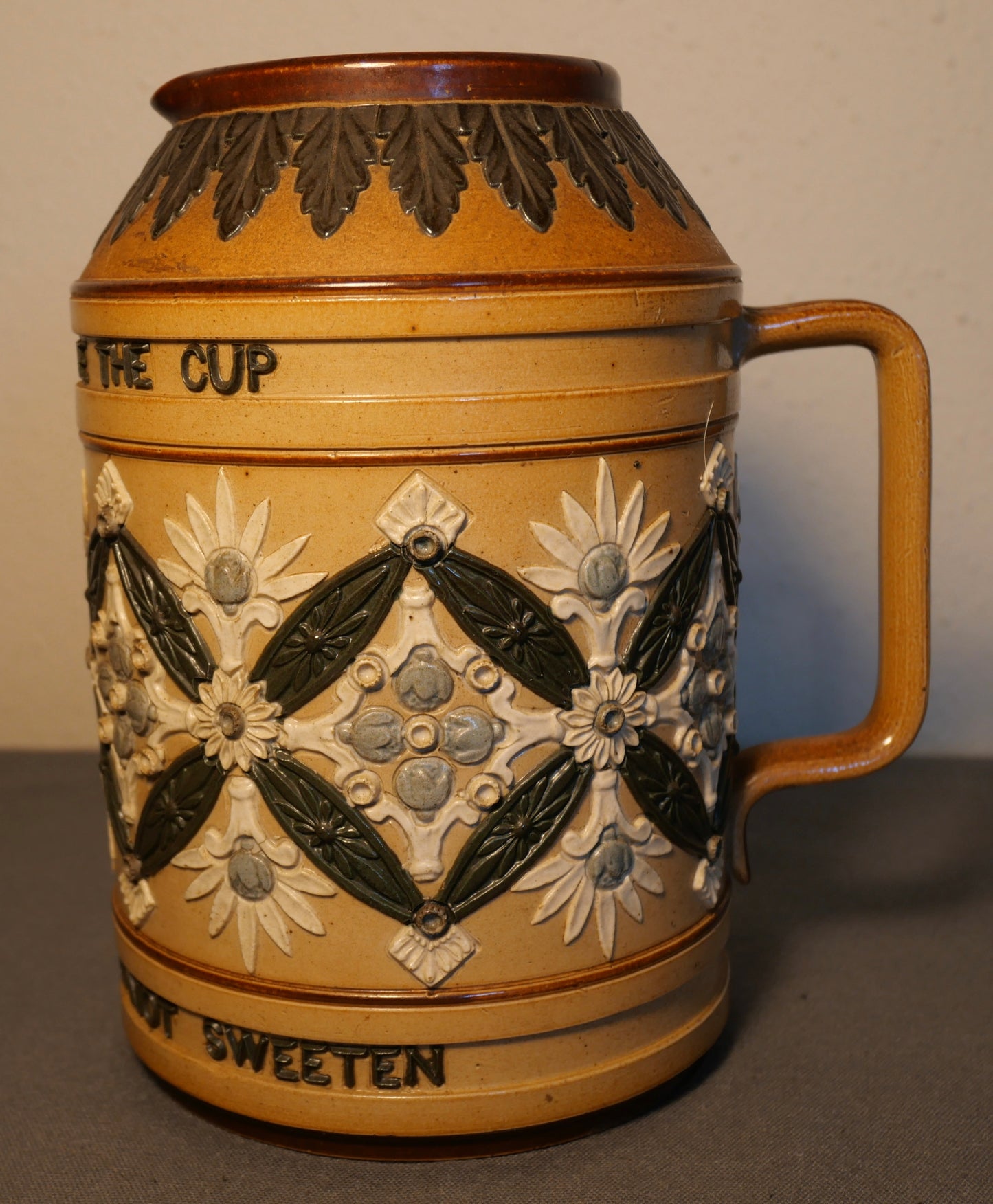 Late 19th Century English Victorian Doulton Lambeth Stoneware "Bitter Must Be The Cup That A Smile Will Not Sweeten" Pitcher