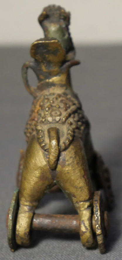 Early 20th Century Indian Gilded Brass Man on Horse Rolling Temple Toy