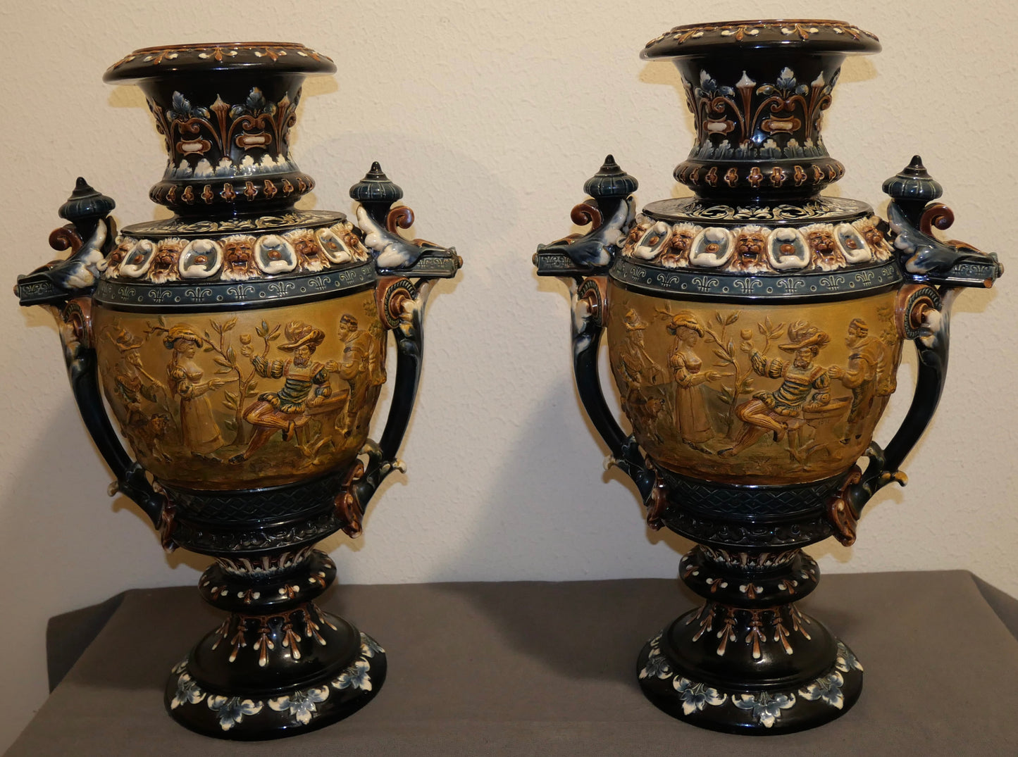 Pair of Late 19th Century Austrian Renaissance Revival Julius Greiner & Son Majolica Figural Scene Motif Double Handled Vases