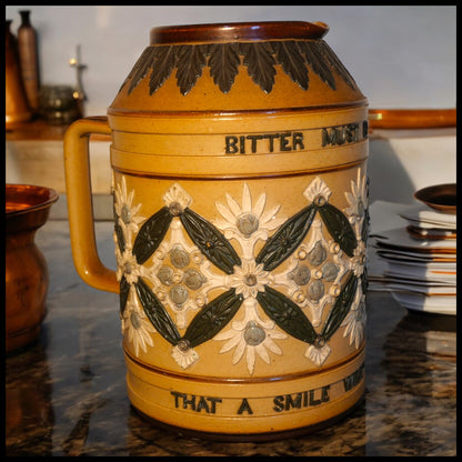 Late 19th Century English Victorian Doulton Lambeth Stoneware "Bitter Must Be The Cup That A Smile Will Not Sweeten" Pitcher