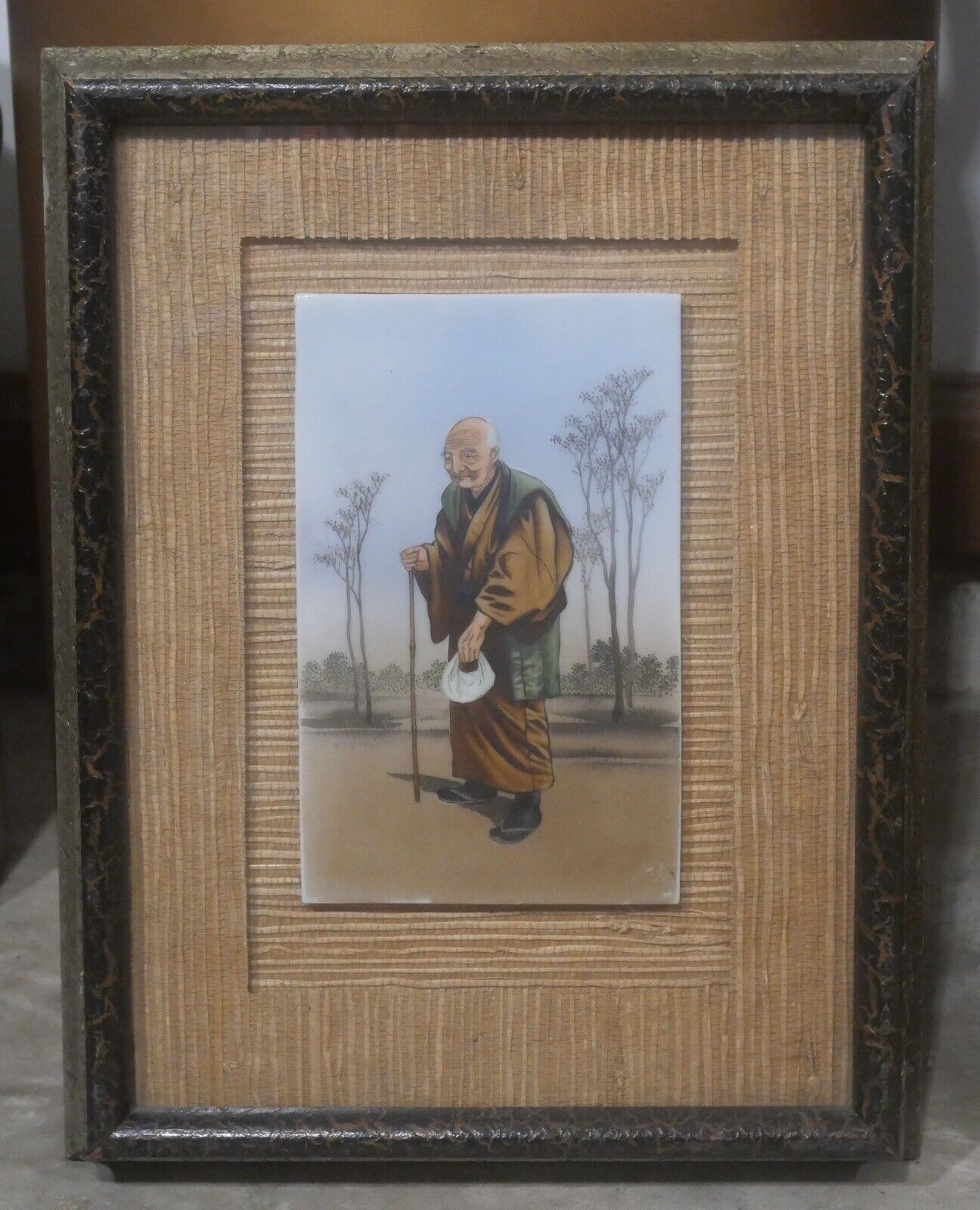 Pair of Mid 20th Century Japanese After Saito Hodo Elderly Man & Woman Framed Painted Porcelain Plaques