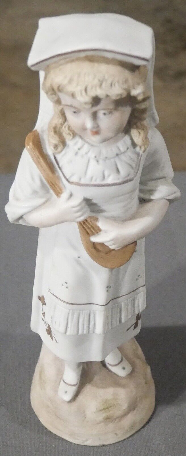 Late 19th Century German Bisque Girl with Mandolin Figurine