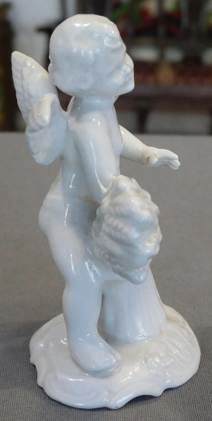 1960’s German Karl Thieme Dresden Porcelain Spring Putto Figurine