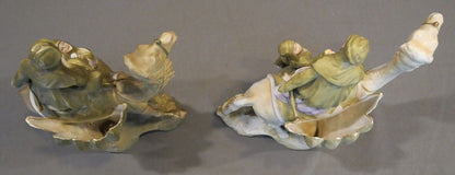 Pair of Circa 1880 German Amphora Style Porcelain Bedouin Camel Rider with Woman Spill Vases