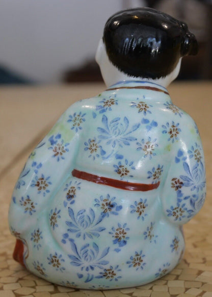 Early 20th Century Chinese Porcelain Girl with Gold Ingot Figurine (Republic Period)