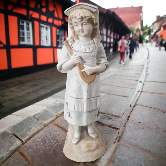 Late 19th Century German Bisque Girl with Mandolin Figurine